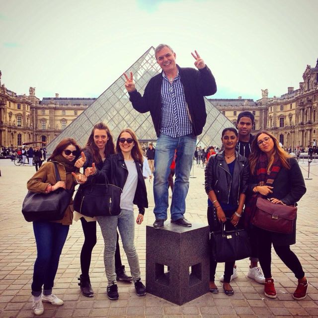 Paris: Guided Walking Tour from Opera Garnier to Notre-Dame - Pont Neuf and Place Dauphine: short stops, good payoff