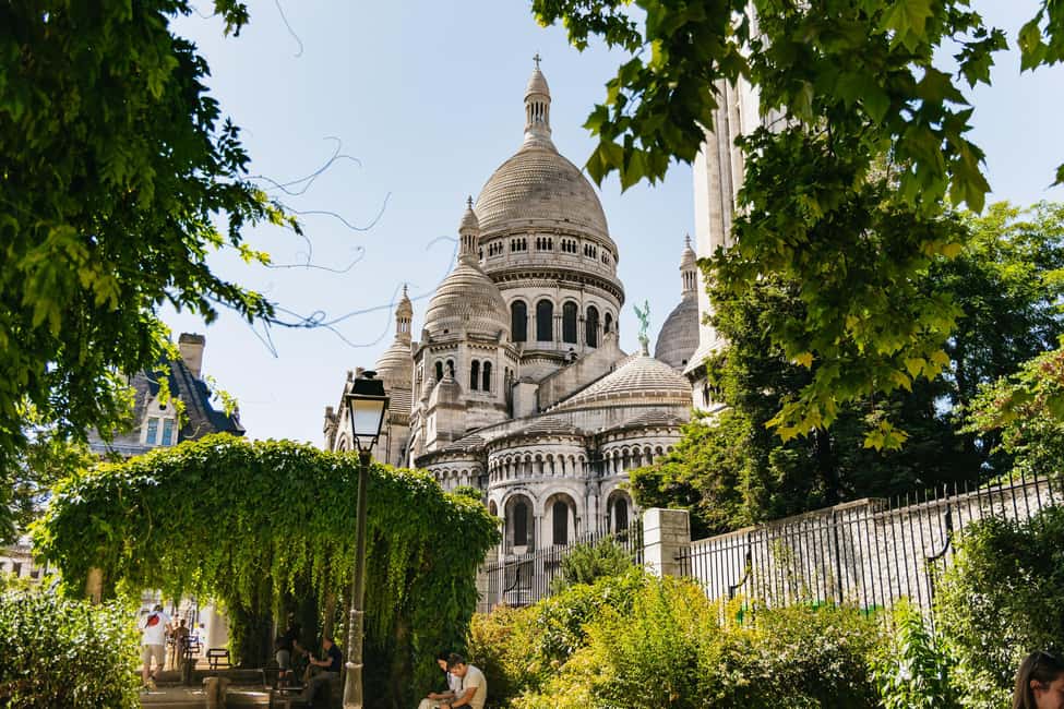 Paris: Hidden Gems of Montmartre with Local Guide - Starting at Blanche and the Moulin Rouge windmill