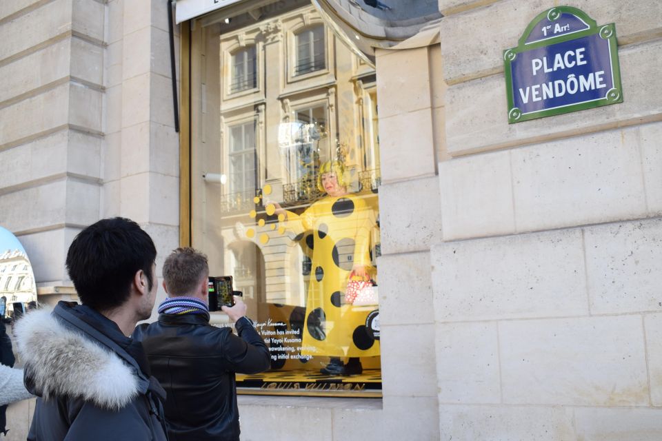 Paris : Highlights of Parisians' Paris guided tour - Rue Vendôme glamour: luxury storefronts with context