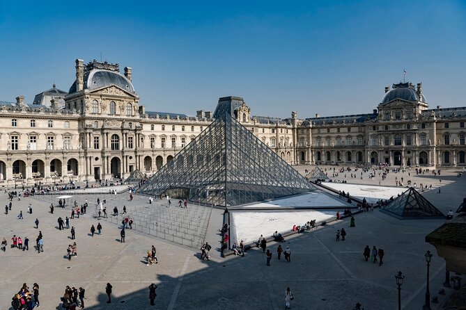 Paris highlights sightseeing tour with private Transportation - Opera Garnier and the Louvre zone: seeing the city’s art magnet from the outside