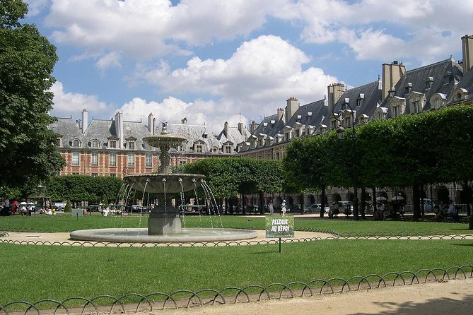Paris Le Marais Historical Walking Tour with Wine and Cheese Tasting - Pont Marie and the Seine Views Toward Notre-Dame