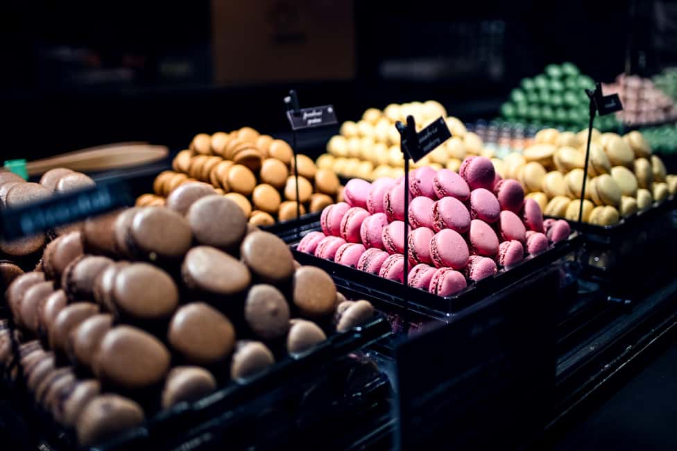 Paris: Montmartre Food Tasting Walking Tour with Secret Dish - The First Stop: Chocolates, Macarons, and How French Sweet Shops Work