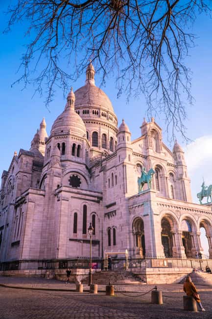 Paris: Montmartre Hidden Gems and Highlights Walking Tour - Getting Started Outside Saint-Jean de Montmartre at Rue des Abbesses