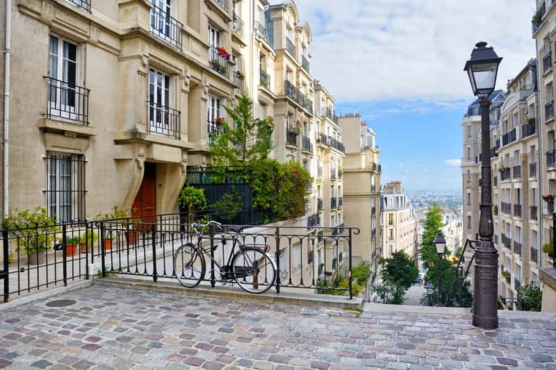 Paris: Montmartre Hidden Gems and Highlights Walking Tour - Rue des Abbesses and the Toulouse-Lautrec Footsteps Feeling