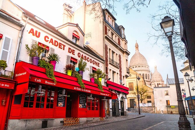 Paris - Montmartre Small Group Walking Tour with a True Local - Getting Oriented: Place Blanche start, easy 1h45 flow