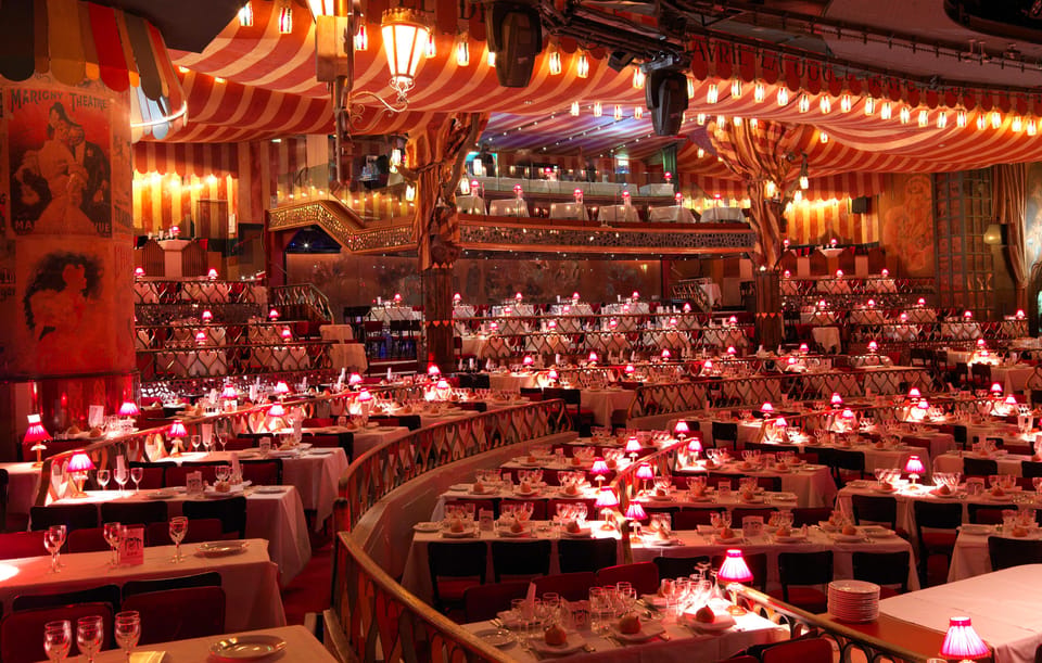 Paris: Moulin Rouge Show with Champagne and Drop-Off Service - Champagne Included: The Nice Touch That Sets the Mood