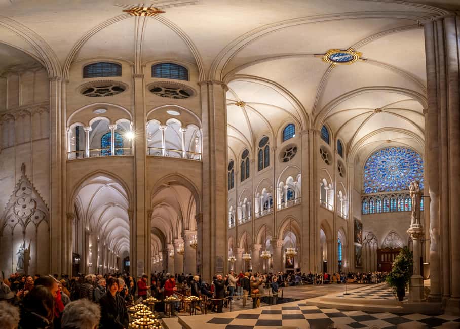 Paris: Notre Dame Cathedral Exterior Tour with Free Entry - The 2019 fire, bell towers, and the Emmanuel Bell