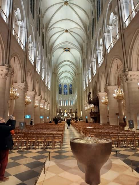 Paris: Notre Dame Cathedral Guided Tour of the Neighborhood - Notre-Dame Cathedral time: self-guided audio inside + a guide option