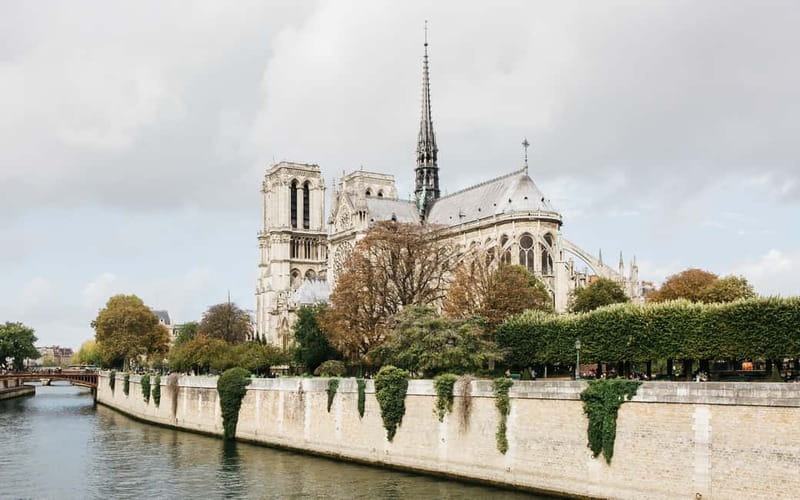 Paris: Notre Dame Exterior Tour with a Small Group - Nine centuries of building effort in one Gothic shell