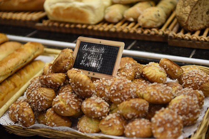 Paris Off the Beaten Path Belleville Tasting Food Tour - Belleville bistro coffee, chocolatier stop, and the bakery kitchen reveal