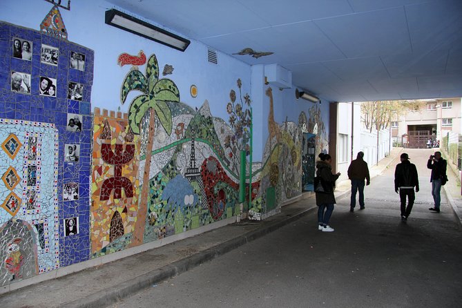 Paris Off the Beaten Path Street Art Walking Tour - Stop 1: Belleville District—Piaf roots, 1980s artist pull, and famous street names