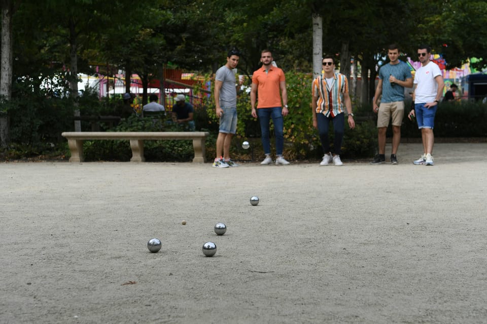 Paris: Pre-Dinner Drinks with Petanque Game (Bocce Ball) - Petanque in Place Bastille: a very Paris kind of break