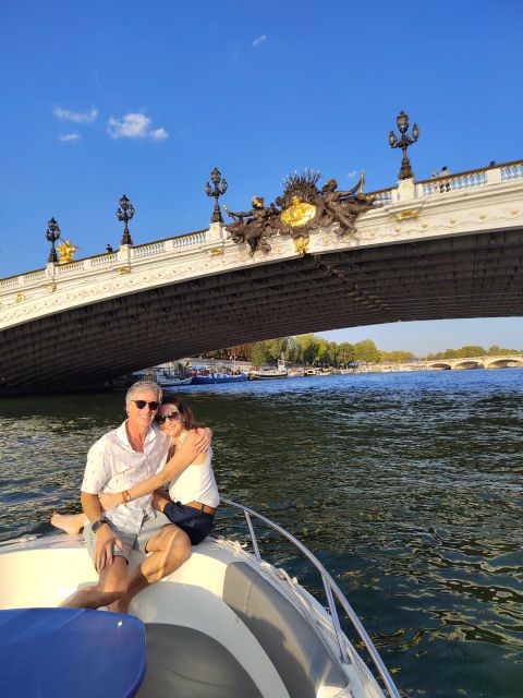 Paris Private Boat Seine River with Captain Guide - Onboard comfort: the big table, front seating, and the no-roof reality