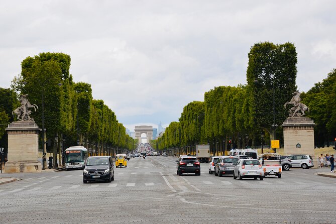 Paris: Private City Tour by Car with Driver and Guide - Place Vendôme, Conciergerie exterior, and Sainte-Chapelle sights