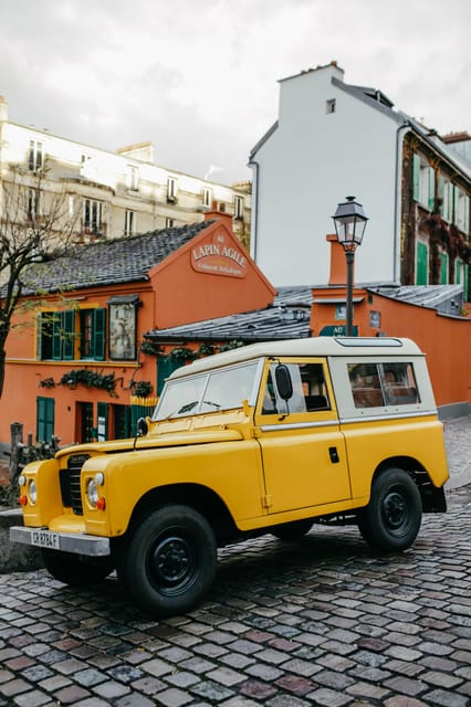 Paris: Private Guided Tour in a vintage Land Rover - 90 Minutes With Pickup on the Right Bank (Traffic Included in the Equation)