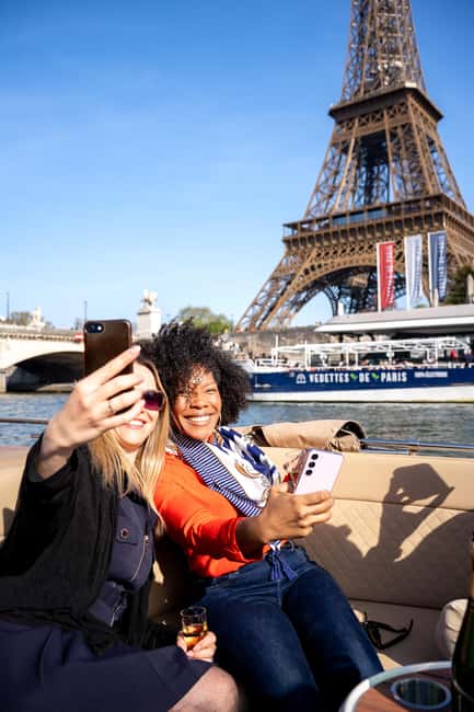 Paris: Private Small Boat Cruise with Rosé and Macarons - The 1.5-hour route: Eiffel Tower to Notre-Dame and back with a twist