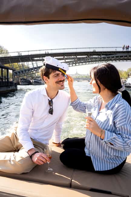 Paris: Private Small Boat Cruise with Rosé and Macarons - Rain, season, and timing: planning for a 6pm evening cruise