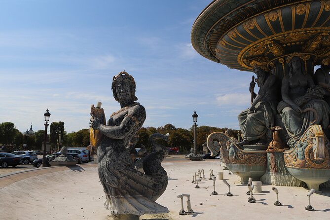 Paris Revolutionary Walking Tour: Iconic French Sights & Stories - Place-Vendome: Luxury After the Storm