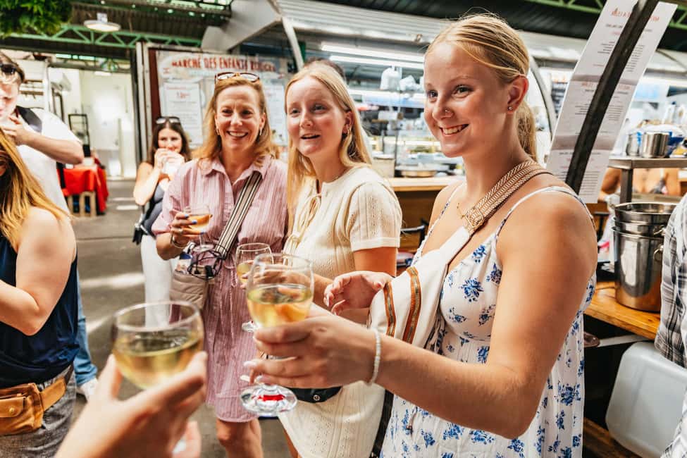 Paris: Walking Food Tour with Cheese, Wine and Delicacies - The tasting lineup: cheese, cured ham, pastries, chocolate, and seasonal surprises