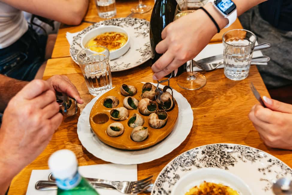 Paris: Walking Food Tour with Cheese, Wine and Delicacies - The included restaurant stop: where the tour turns into a real meal