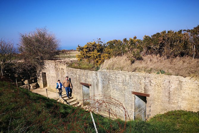 Pointe du Hoc,Omaha Beach, American Cemetery - Day trip from Paris to Normandy - National Guard Monument at WN72: honoring the breakthrough point
