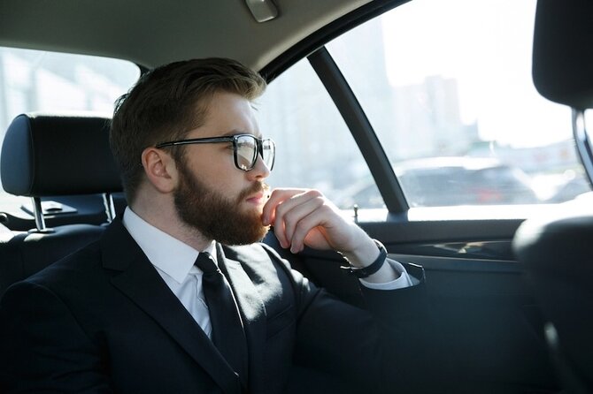 Private Airport Transfer between Paris and Parisian Airports - Meet-and-Greet at CDG, Orly, and Le Bourget with a Digital Name Sign