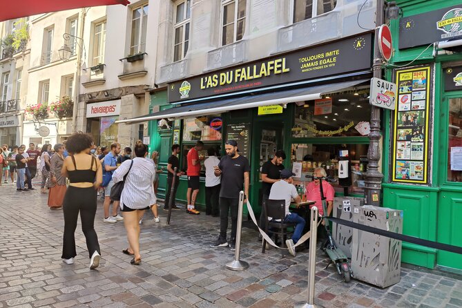 Private Full Day Paris trip including Louvre and Versailles with Pickup - Le Marais in a walking window: cobblestones, boutiques, and pacing
