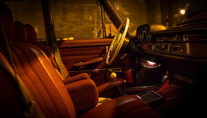 Private Paris guided Tour by classic 1970 Mercedes S Class - Place des Vosges: where the car turns a square into a photo set