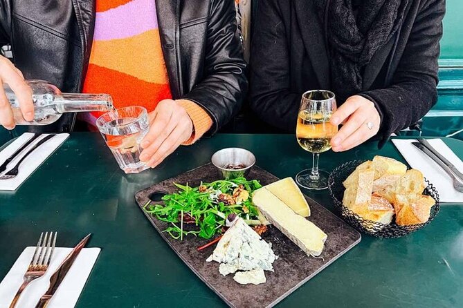 Private Parisian Food Tour in Charming Neighborhood Le Marais - Stop-by-stop: croissant, cheese, wine, and the Paris-baguette connection