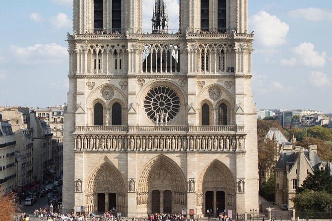 Private Tour with Tickets to the Louvre Museum & Crepes - Markets, City Hall, and a Tower That Survived