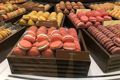 Pure Chocolate Tour in Paris - The tasting lineup: macaroon, 10 chocolates, calisson, croissant
