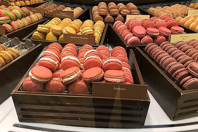 Pure Chocolate Tour in Paris - The tasting lineup: macaroon, 10 chocolates, calisson, croissant