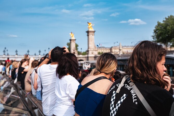 River Seine Sightseeing Boat Tour with Audio Guide - Upper Deck Seating: Where Your Photos Actually Improve