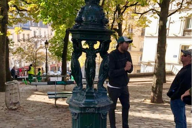 See 15+ Top Sights Paris Tour with Fun Guide, (Walking and Metro Tour) - Meeting at Rue Lepic: what your guide sets up in the beginning