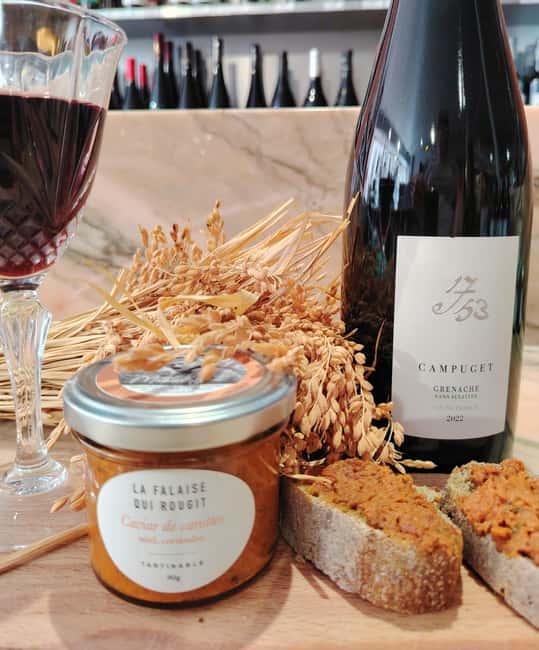 The 100% French Apéritif in Paris - The apéritif spread: wine, Daniel Gobet pâté en croûte, chips, olives