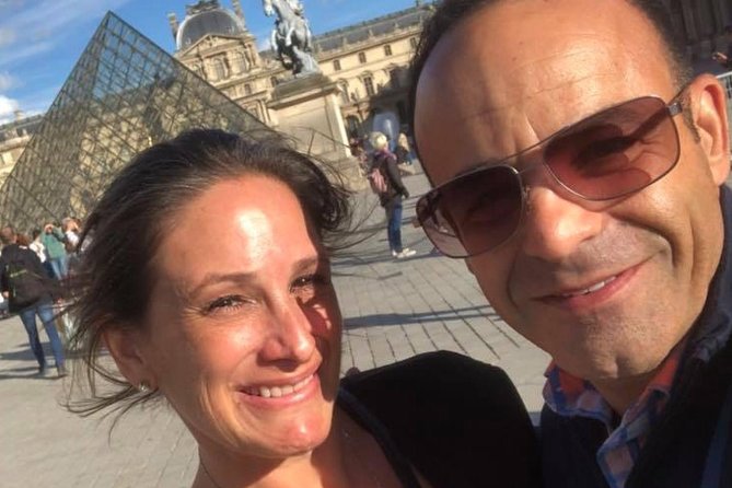 The Great Paris Layover: Private Tour with optional car upgrade - Arc de Triomphe and the Night Flame Tradition