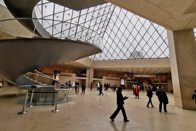 Versailles Palace & Louvre Museum Private Day Tour from Paris - The pace: guided, but still a long day