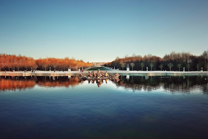 Versailles Palace & Louvre Museum Private Day Tour from Paris - Versailles gardens: fountain show days vs free-access days