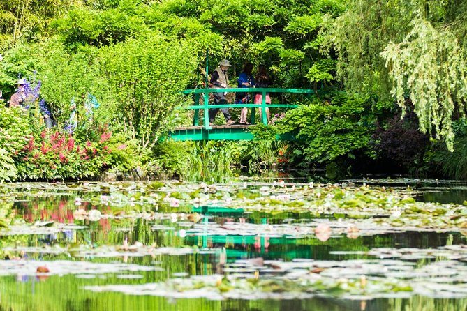 Versailles Timed Entrance Ticket and Giverny Small Group Day Trip from Paris - Monet’s Clos Normand in Giverny: Garden Views, the Footbridge, and the House